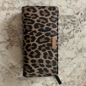 Leopard print Kate Spade wallet.